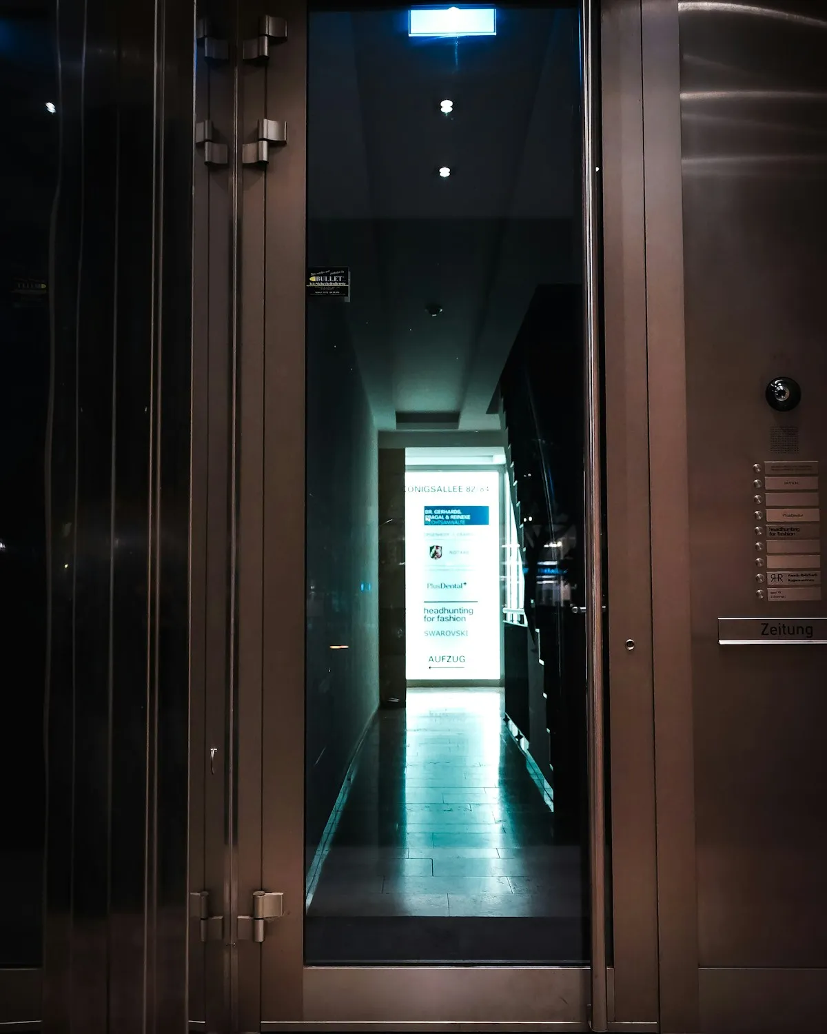 A reinforced glass panel door representing transparent security standards