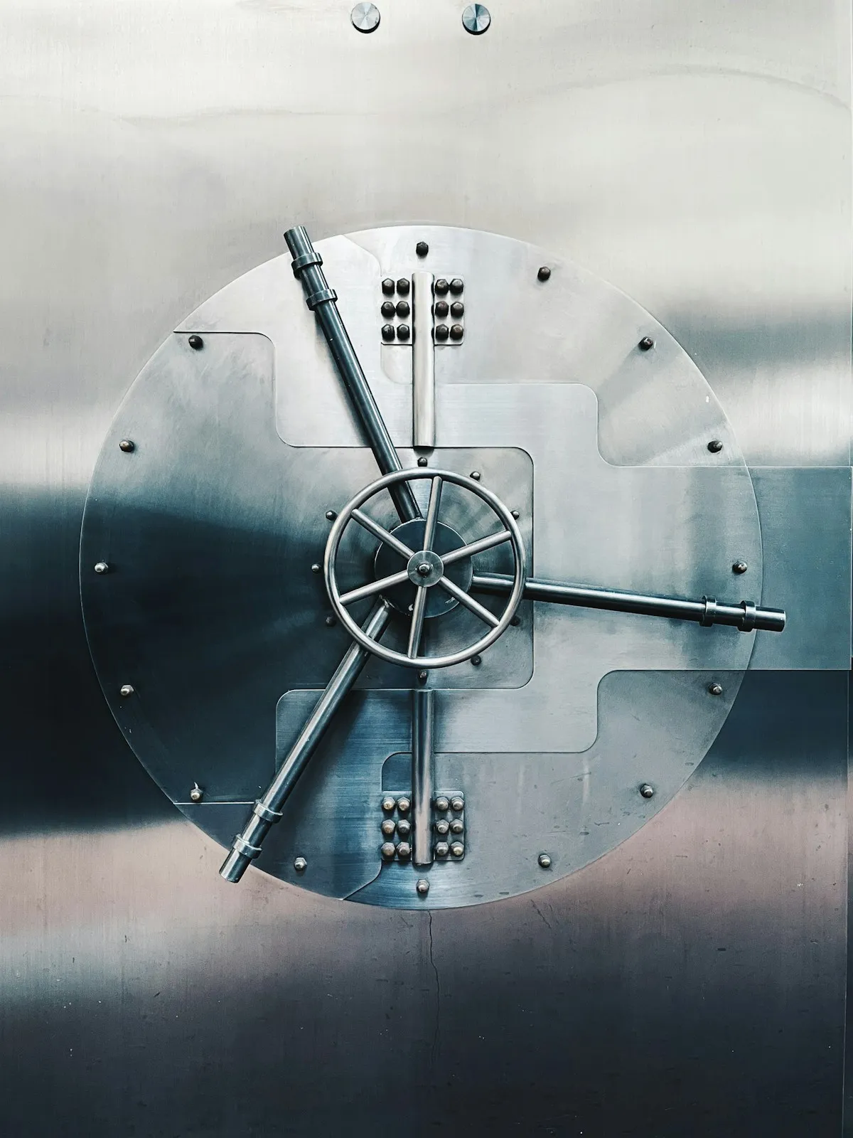 A ship’s steering wheel, representing the careful navigation required when diversifying precious metals across multiple vault providers and storage strategies