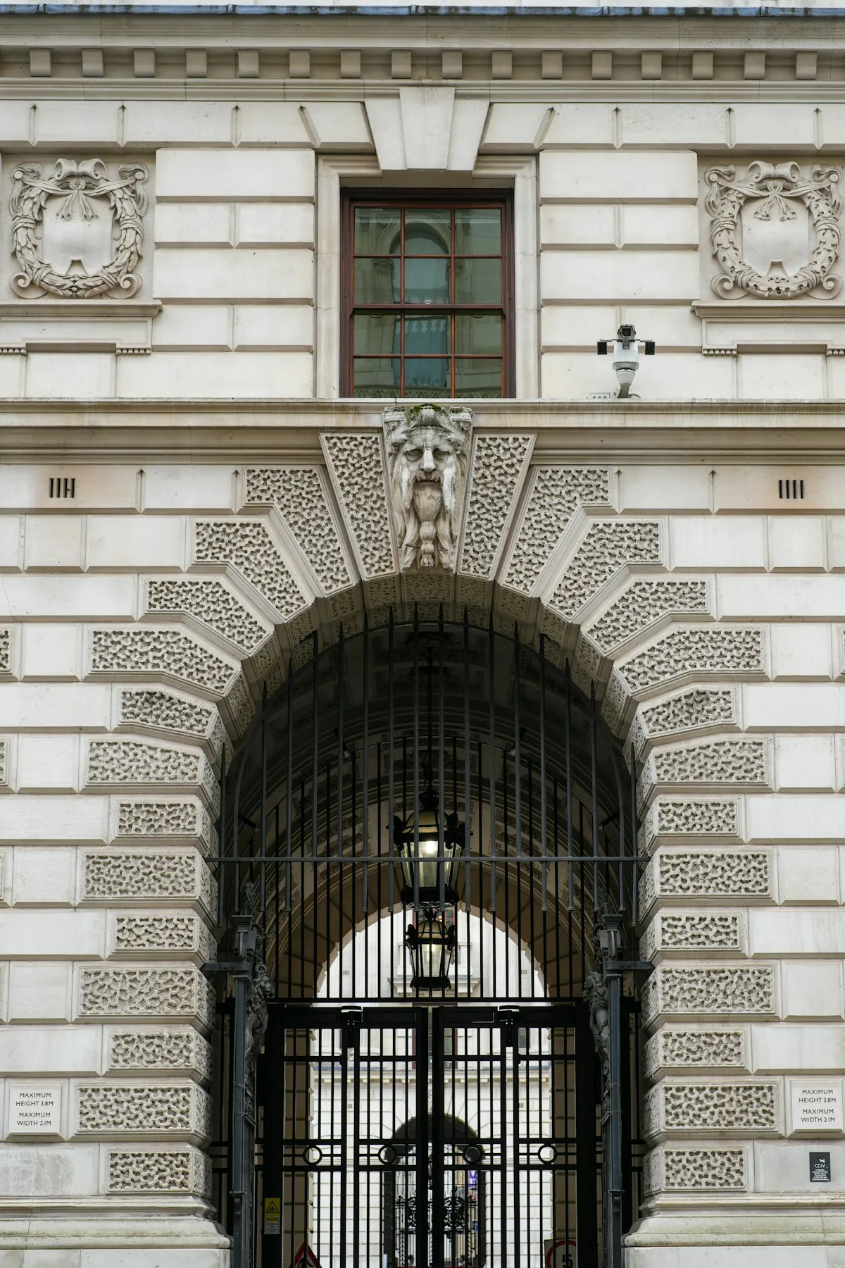 The grand entrance of a central bank building, symbolizing the institutional gravity behind the world’s largest gold reserves